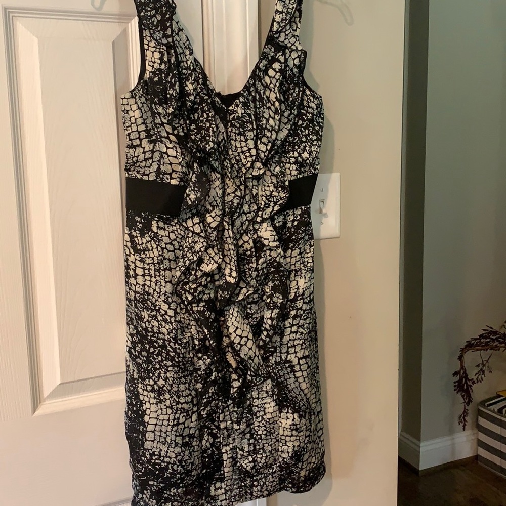Cute cocktail dress.  Snakeskin like print.